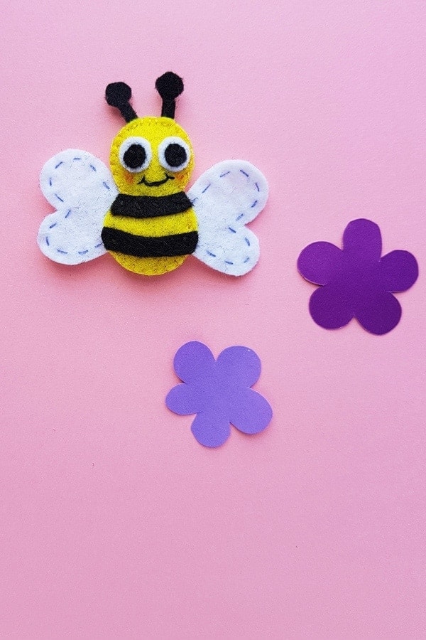 Yellow and black felt bumble bee with white wings