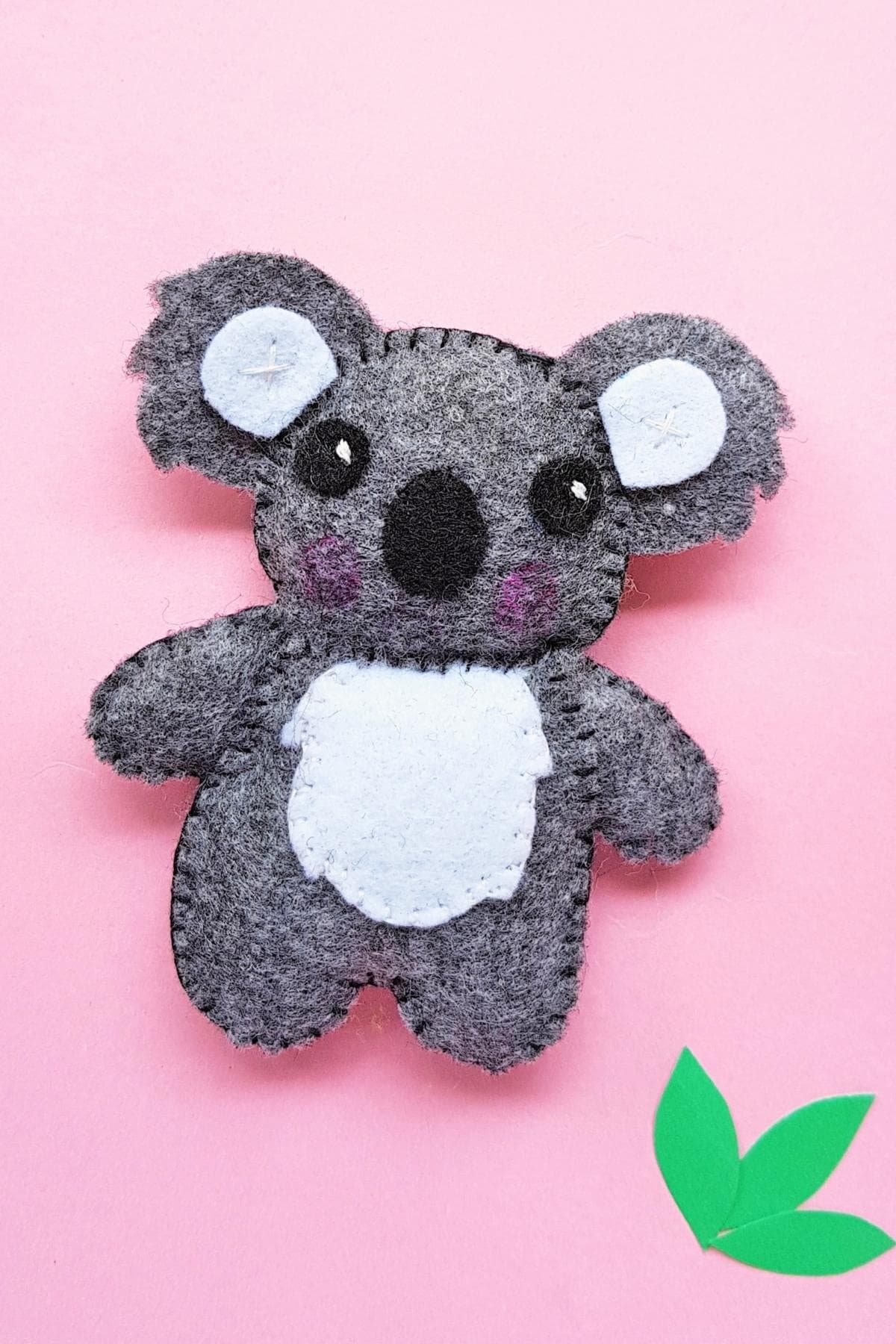Gray felt koala sewn with a white belly and black nose