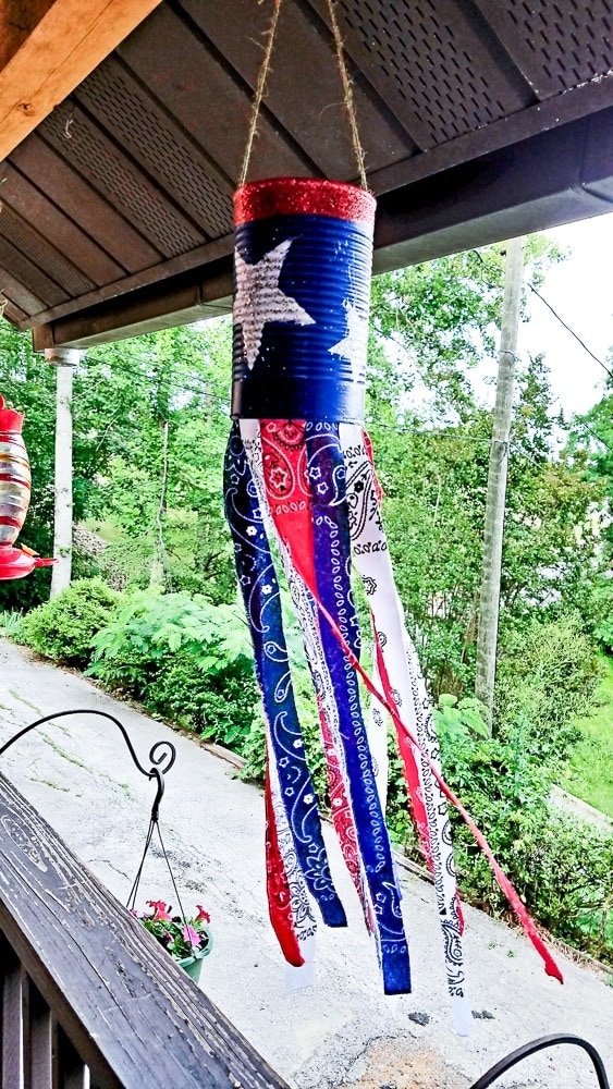 Red, white and blue windsock with star decorations and fabric strips